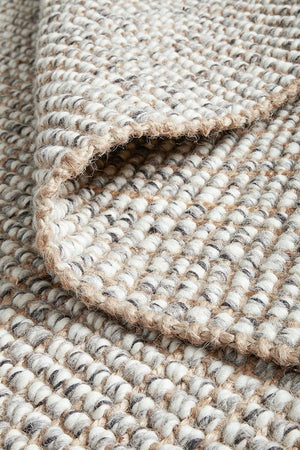 Scandi grey rug styled in a Scandi-inspired bedroom setting