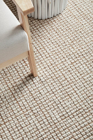 Scandi natural wool and jute rug — lifestyle shot in Scandinavian-style living room
