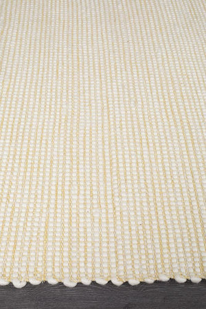 Evoke Yellow rug — side angle showing double-sided flatweave construction