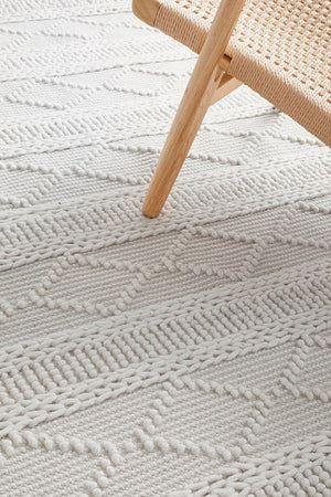 Zoe flatwoven rug — dreamy ivory tones in a bedroom setting
