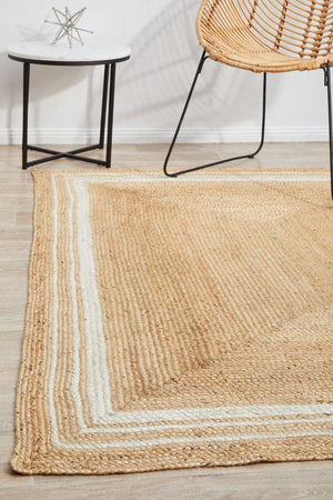 Byron 111 Natural jute rug — lifestyle shot in coastal living room