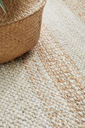 Byron 555 Natural White rug in a coastal dining room setting
