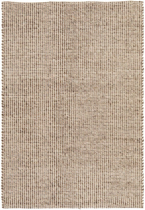 Navia brown rug styled in a warm Scandi-inspired living room