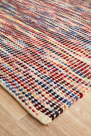 Navia Multi wool rug — side angle showing double-sided flatweave construction