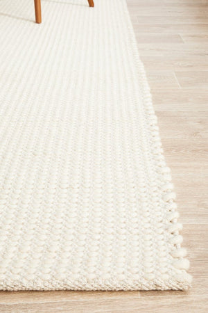 Navia White rug — full product shot showing clean white colourway