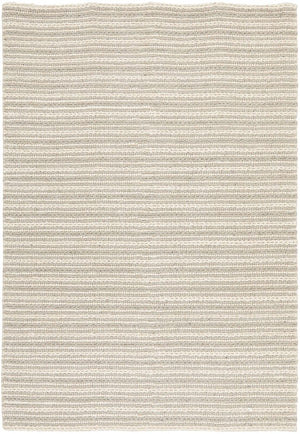 Navia 320 Grey rug styled in a contemporary minimalist bedroom