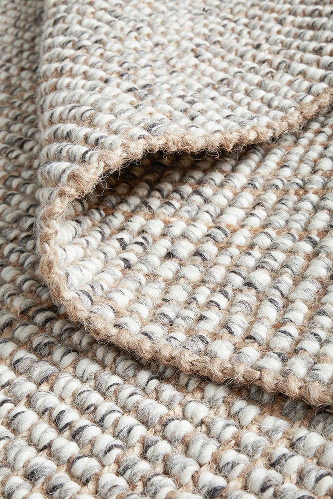 Scandi grey rug styled in a Scandi-inspired bedroom setting