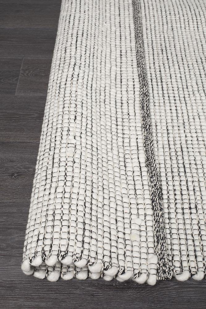Evoke Black wool rug — detail shot showing rich black colourway