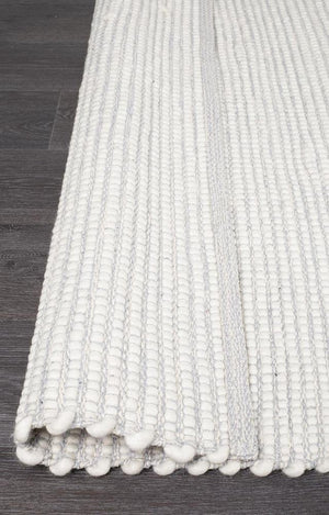 Evoke Grey wool rug — detail shot showing soft grey colourway