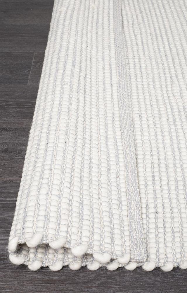 Evoke Grey wool rug — detail shot showing soft grey colourway
