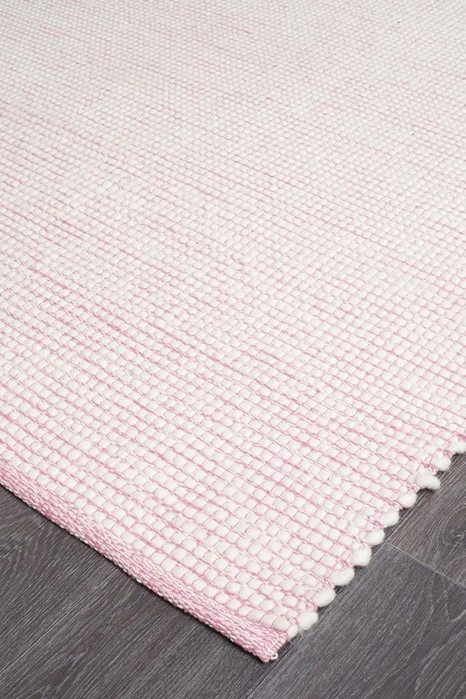 Evoke Pink flatweave rug — close-up of felted wool weave detail