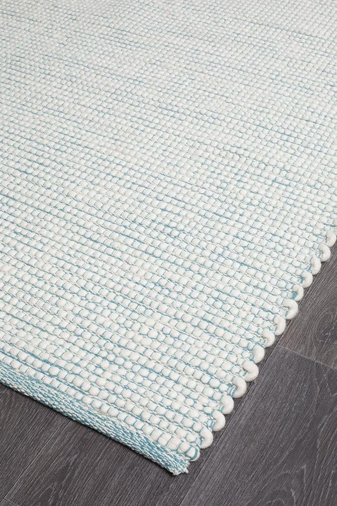 Evoke Turquoise flatweave rug — close-up of felted wool weave detail