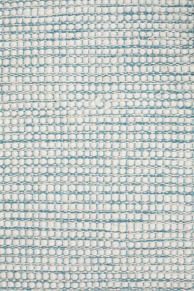 Evoke Turquoise flatweave rug — full product shot on white background