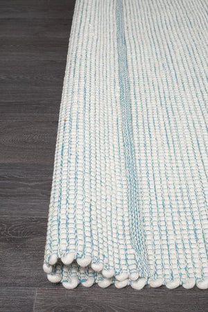 Evoke Turquoise wool rug — detail shot showing vivid aqua colourway