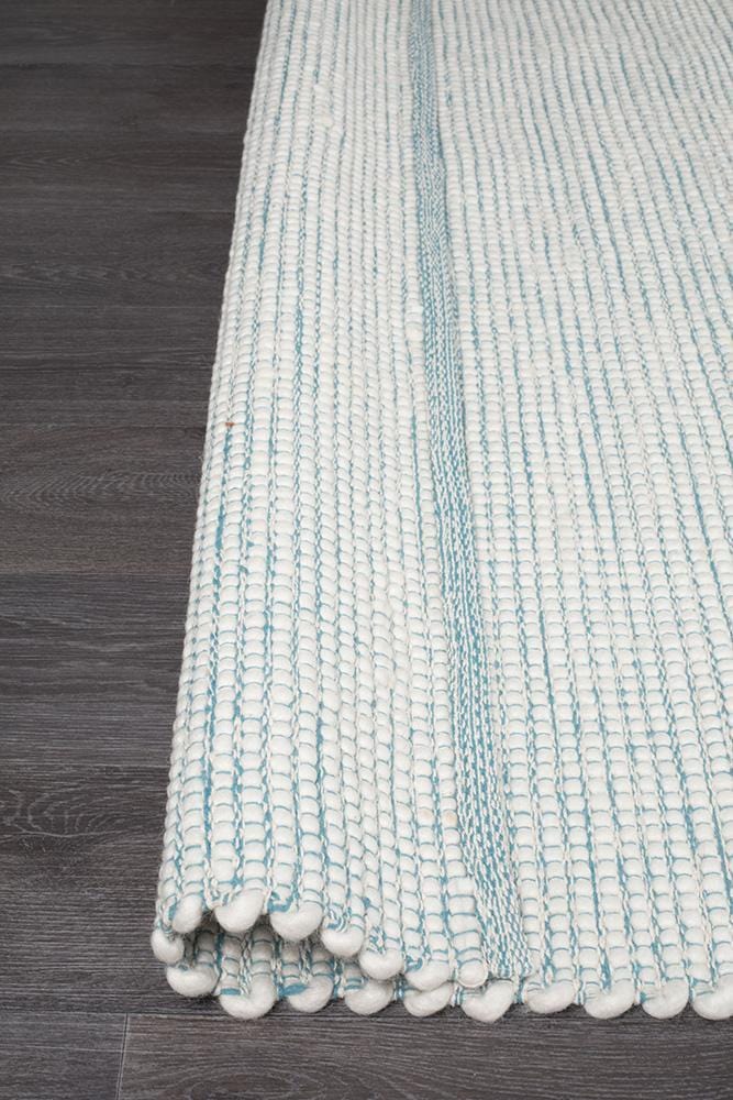 Evoke Turquoise wool rug — detail shot showing vivid aqua colourway