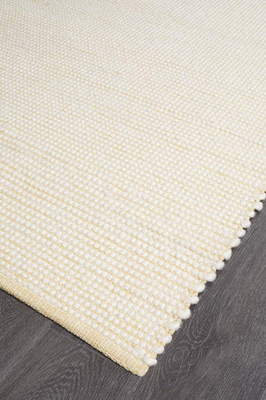 Evoke Yellow flatweave rug — close-up of felted wool weave detail