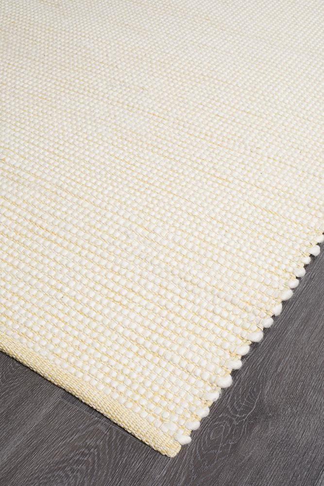 Evoke Yellow flatweave rug — close-up of felted wool weave detail