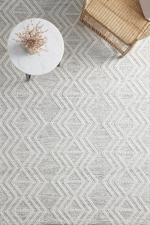 Clara flatwoven wool rug in ivory and black — lifestyle room shot
