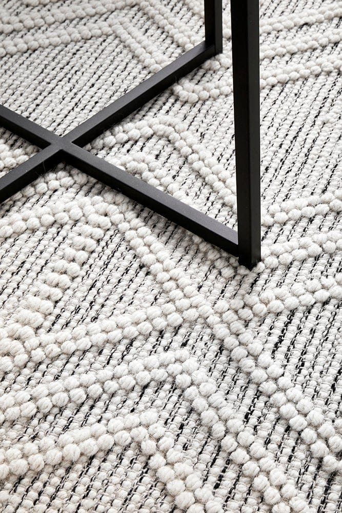 Clara wool rug styled in a living room setting