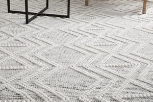 Clara wool rug — landscape lifestyle image, coastal interior style