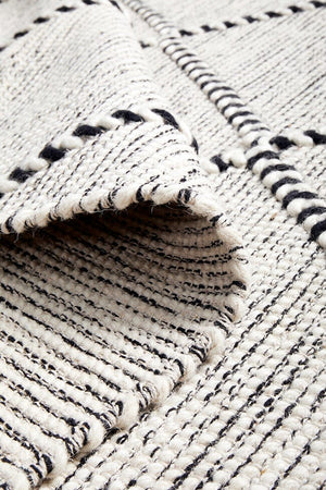 Jasmin hand loomed rug — side angle showing pile texture and geometric pattern