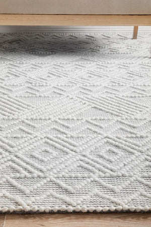 Kate wool rug — landscape lifestyle image, coastal interior style
