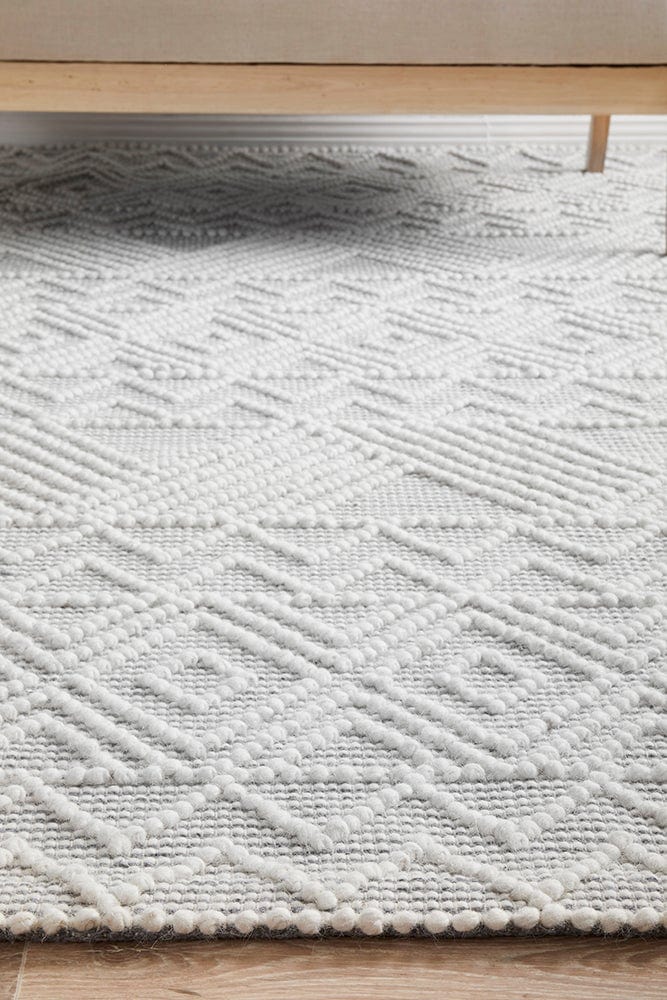 Kate wool rug — landscape lifestyle image, coastal interior style