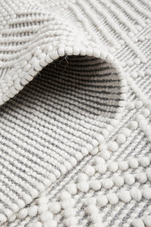 Kate hand loomed rug — side angle showing pile texture and tribal pattern