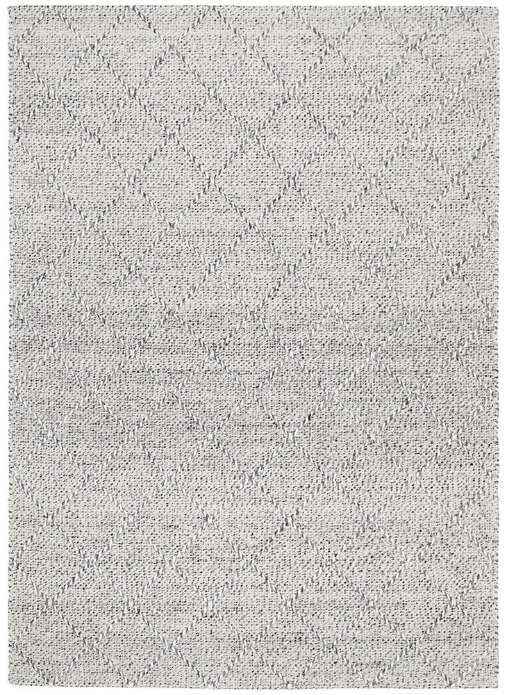 Noah flatwoven rug — close-up of geometric texture and weave detail