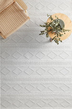 Zoe flatwoven wool rug in ivory — lifestyle room shot