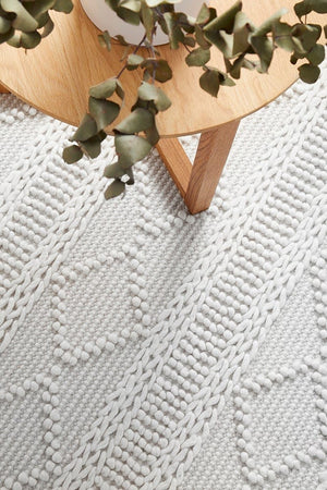 Zoe hand loomed wool rug — top-down flat lay view