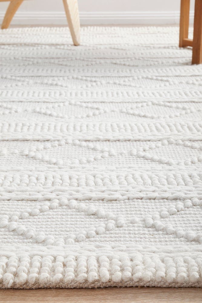 Zoe wool rug styled in a contemporary living room