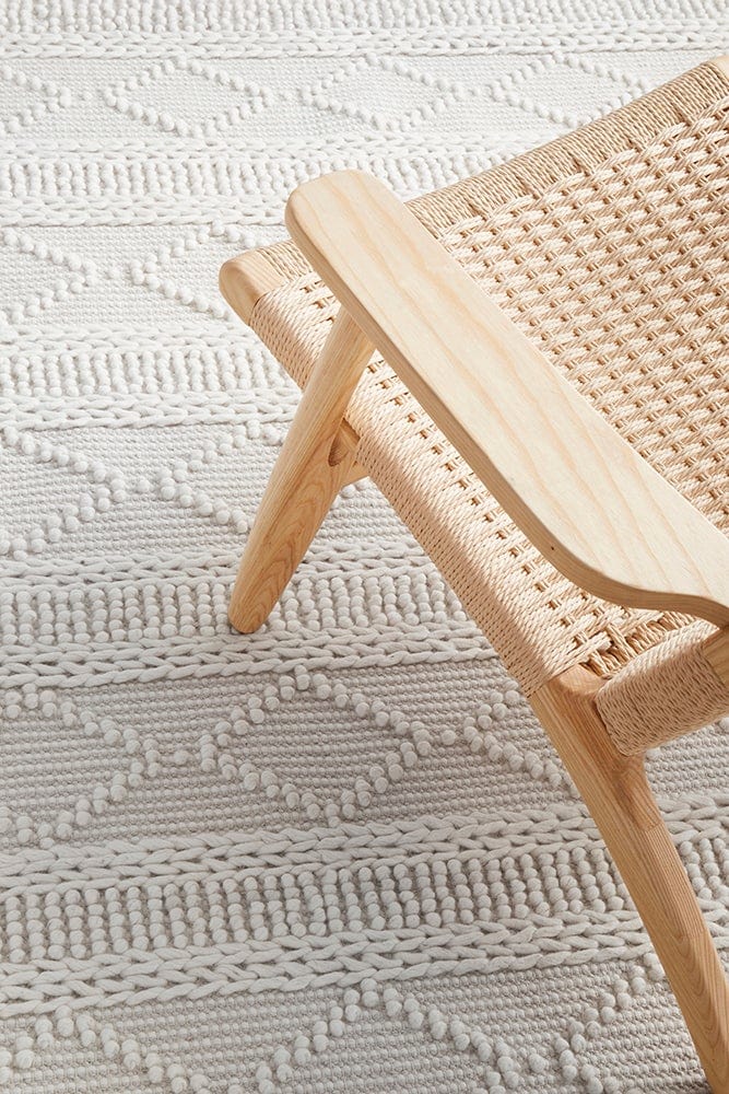 Zoe wool rug — landscape lifestyle image, coastal interior style