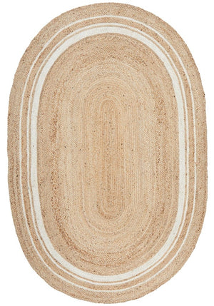 Byron 111 Natural Oval rug styled in a minimalist bedroom setting