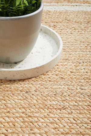 Byron 111 Natural Oval rug in a coastal living room setting