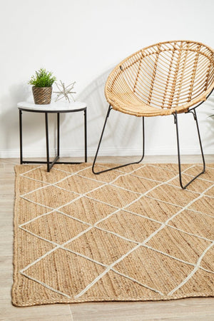 Byron 222 Natural jute rug — lifestyle shot in coastal living room