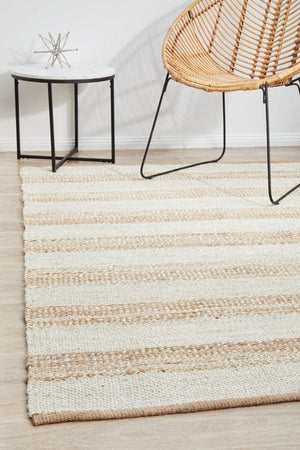 Byron 555 Natural White jute rug — lifestyle shot in coastal living room