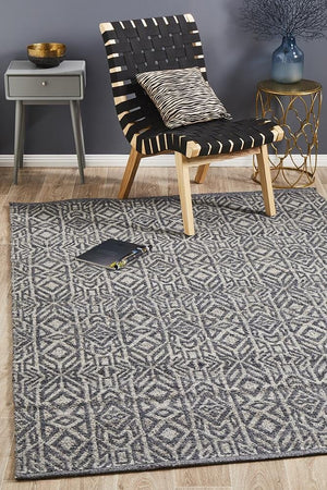 Sammy handwoven graphite cobalt wool rug — lifestyle room shot