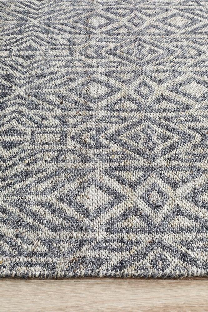 Sammy rug — side angle showing 8mm flatwoven pile and geometric motif