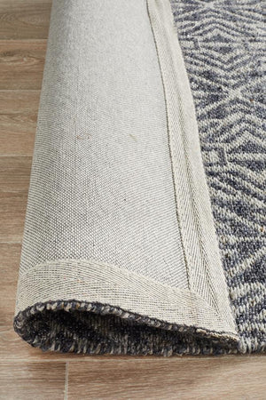 Sammy rug detail — graphite cobalt colourway in a modern interior
