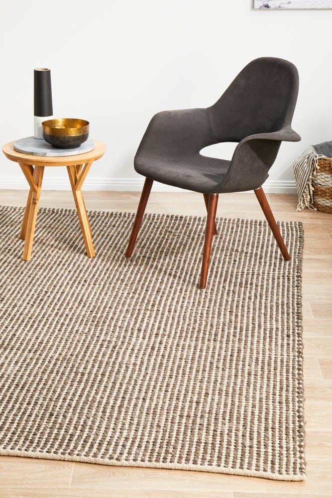 Navia brown flatweave rug — close-up of wool weave detail