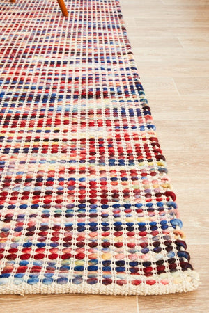 Navia Multi rug — full product shot showing bold multi-coloured pattern