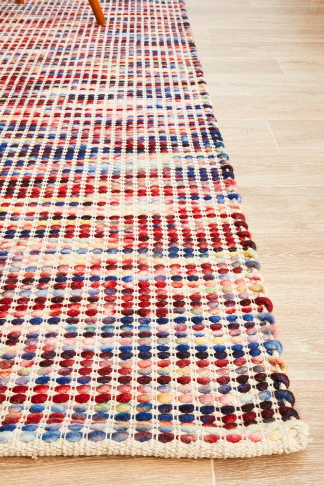 Navia Multi rug — full product shot showing bold multi-coloured pattern