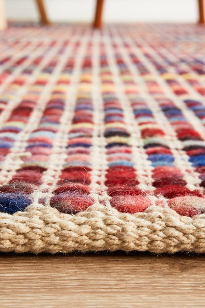 Navia Multi flatweave rug — detail shot of multi-colour wool weave