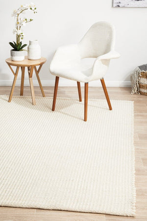 Navia White flatweave rug — close-up of white wool weave detail