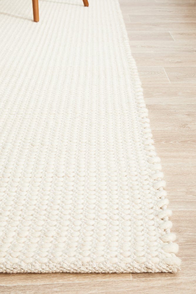 Navia White rug — full product shot showing clean white colourway