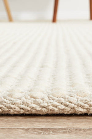 Navia White flatweave rug — detail shot in coastal interior