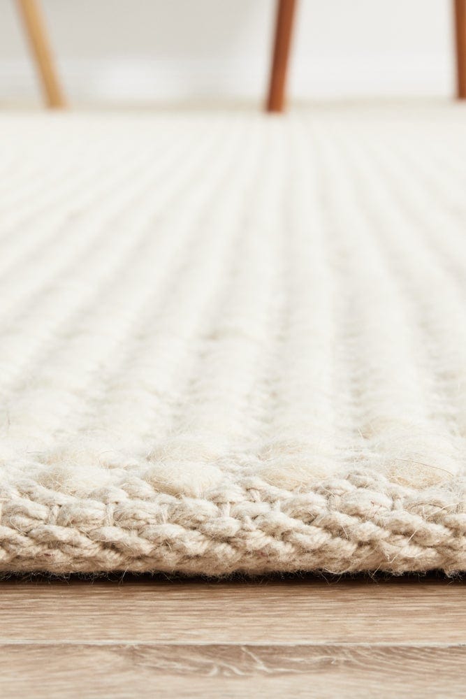 Navia White flatweave rug — detail shot in coastal interior