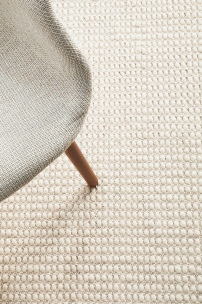 Navia White rug — styled in open-plan living room