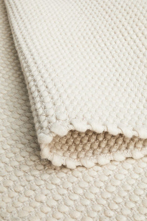 Navia White flatweave wool rug — product shot on white background